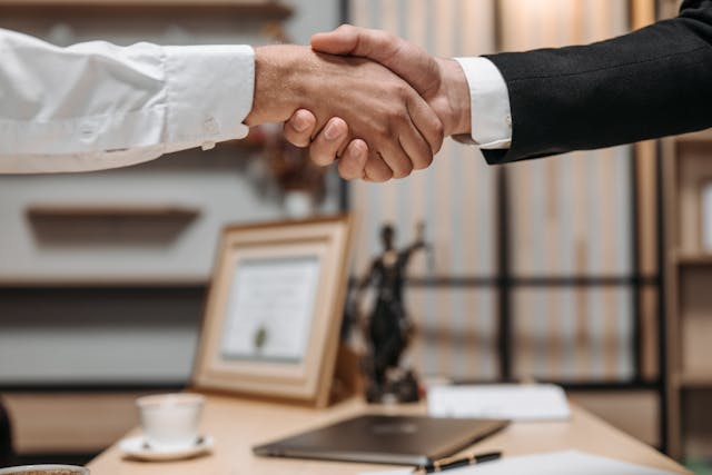 close-up-photo-of-people-shaking-hands