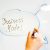 person writing on white paper