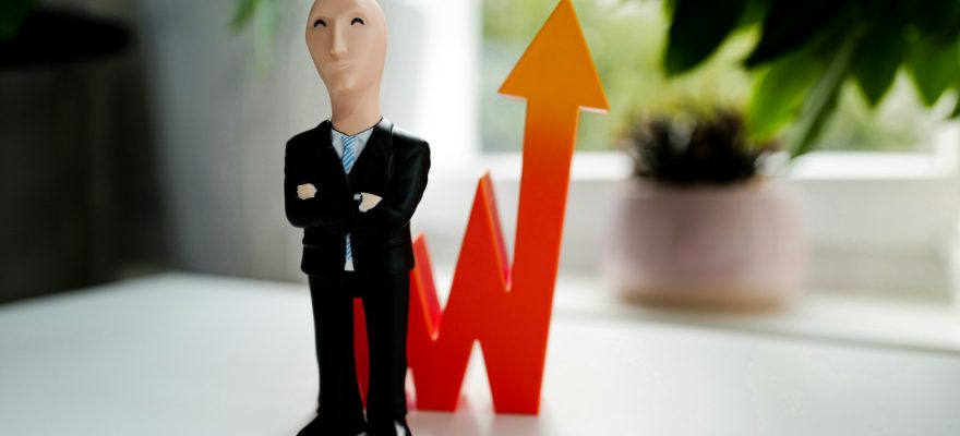 man in black suit jacket and black pants figurine